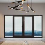 Nowoczesne drzwi aluminiowe – realizacje: MasterLine 8 od Reynaers Aluminium w eleganckim domu